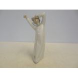 Lladro figure of a boy Height 21 cm