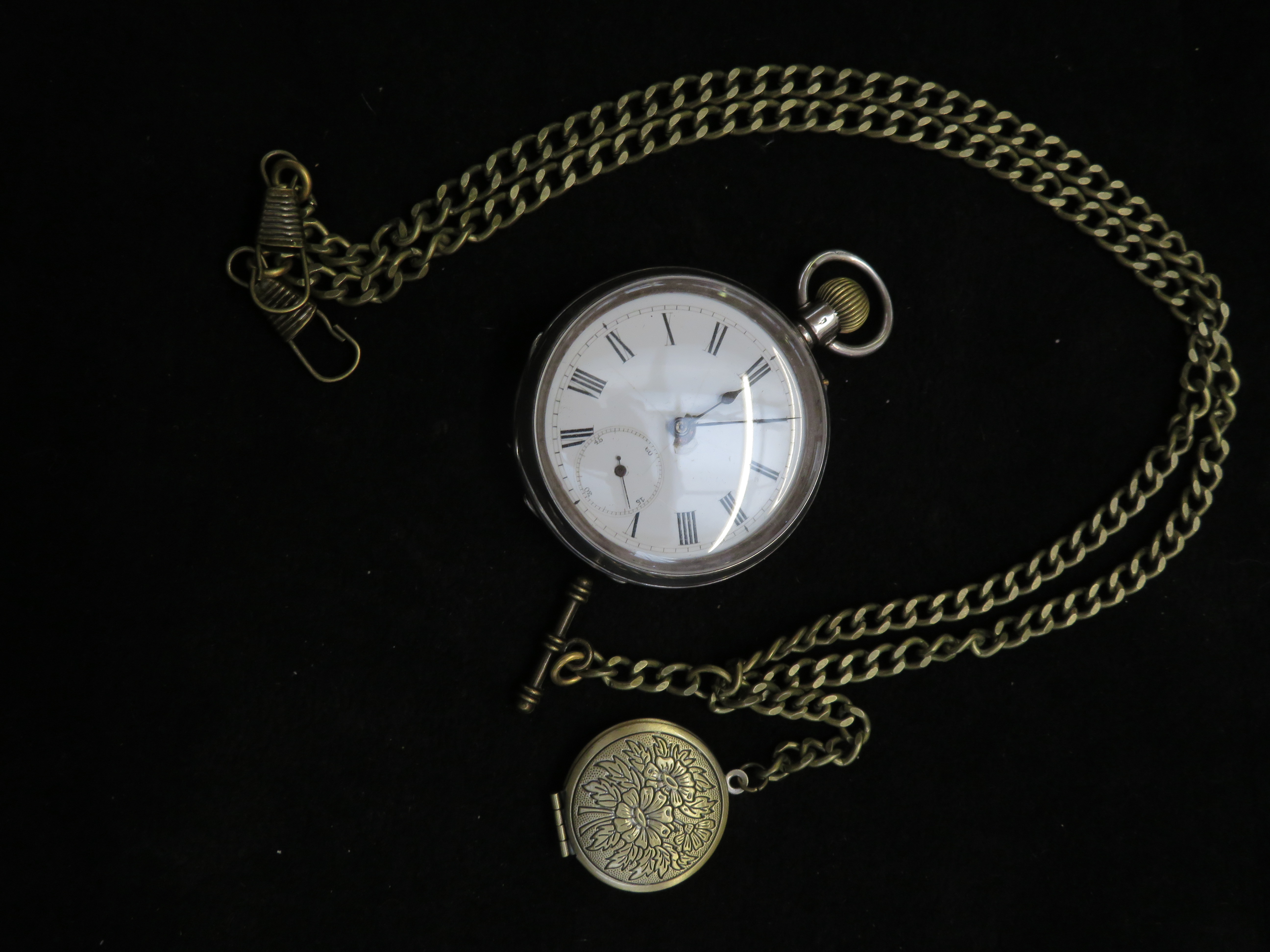 Silver cased pocket watch with chain, T-Bar & pend