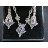 Silver ornate necklace & earrings