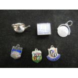 6 Silver charms, 1 charm with old 1 pound note