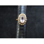 9ct Gold ring set with central amethyst Size N