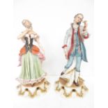 A large pair of Capodimonte masquerade figures. Th