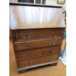 4 Draw writing bureau in medium oak