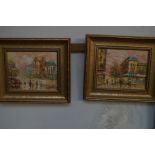 Pair of oil on board city scene in gilt frames