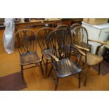6x Early 20th century wheel back chairs, 2 carvers