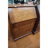 4 Draw writing bureau in medium oak