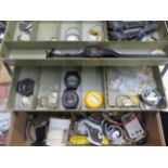 Fishing box with wristwatch contents