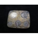 Early white metal coin holder