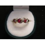 9ct Gold ring set with rubies & diamonds