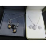 2 silver necklace sets