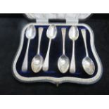 Boxed silver ornate spoon set