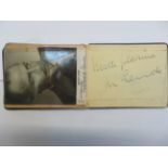 Small autograph book containing signatures from- R
