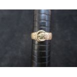 9ct Gold ring in the form of a belt Size M