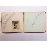 Small autograph book containing signatures from -B