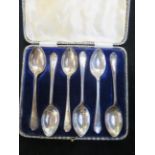 Cased set of 6 silver golfing spoons
