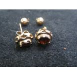2x Pair of 9ct gold earrings set with garnets