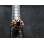 9ct Gold cluster ring set with garnets