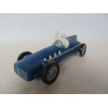 Cast iron blue Michelin man in racing car