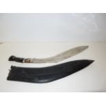 Large Kukri knife, ornate metal blade with scabbar