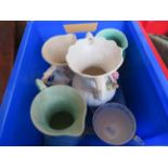Box of ceramic water jugs