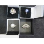 4 Silver dress rings