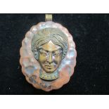 Unusual copper pendant