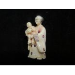 Ivory netsuke model of a oriental lady