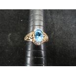 9ct Gold ring set with blue stone & diamonds