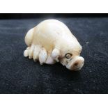 Ivory netsuke model of a pig