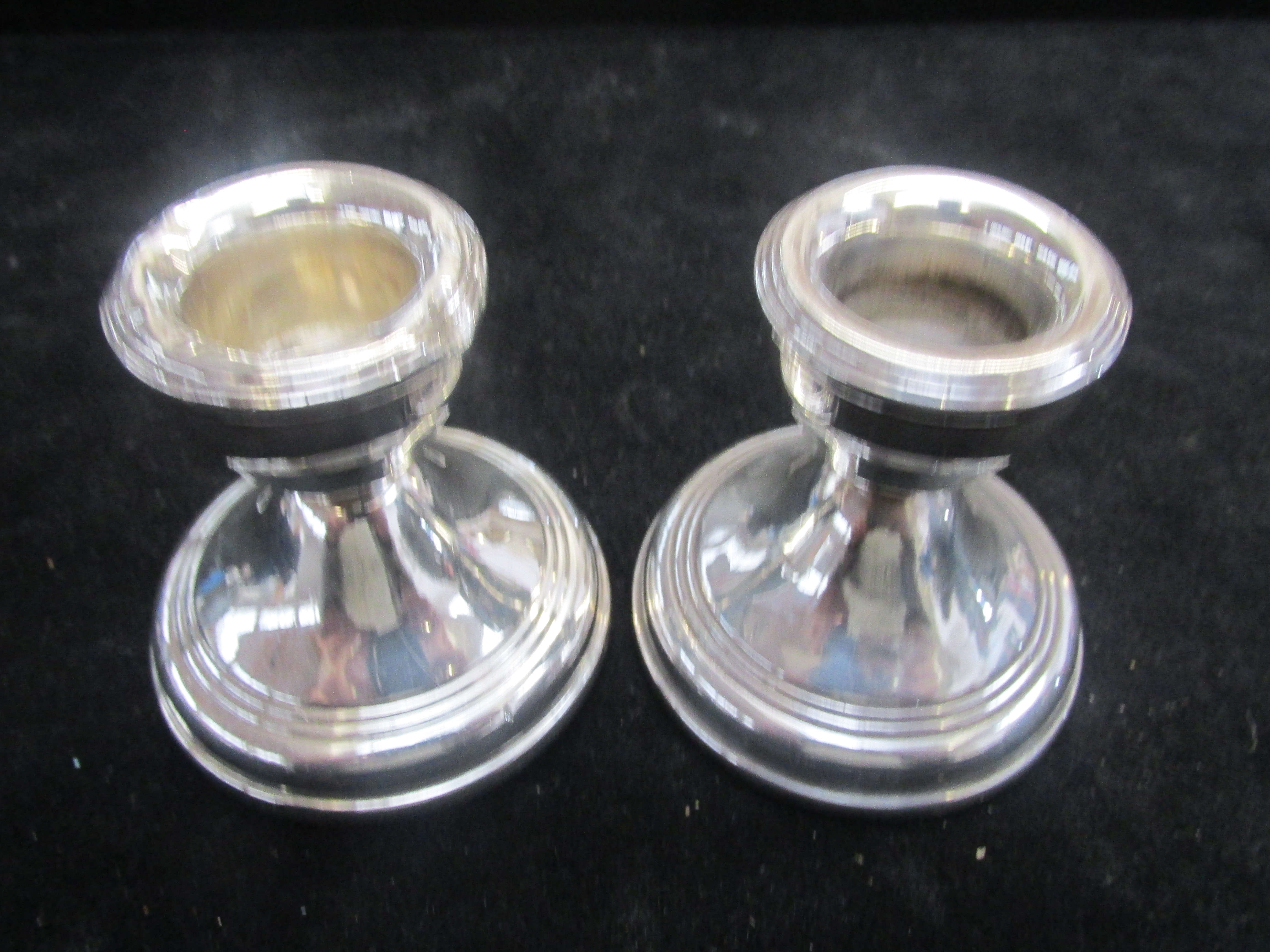 Pair of silver short candle sticks