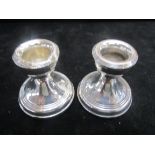 Pair of silver short candle sticks