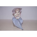 Lladro figure of a seated girl