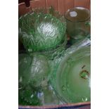 Large box of green glass ware