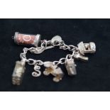 Silver charm bracelet with 8 charms