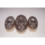 3 Silver backed brushes Birmingham 1902