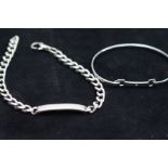 Silver ID bracelet together with a silver bangle