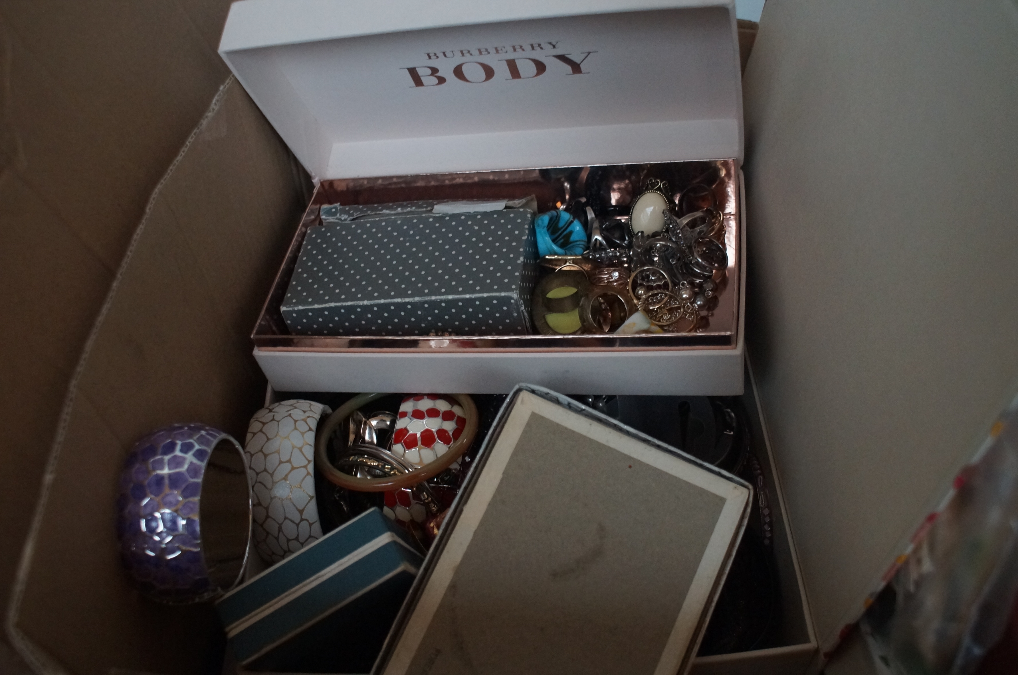 Large box of unsorted costume jewellery