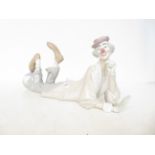 Large Lladro clown lying down, hand A/F length 57