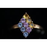 9ct gold ring set with topaz, pink sapphire and ci