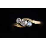 18ct gold 3 diamond ring. Central diamond approx 0