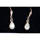 9ct Gold solitaire earrings