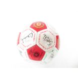 Signed Manchester United football to include David