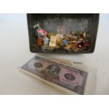 Vintage tin of pin badges & bank notes