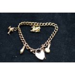 9ct Gold charm bracelet Weight 20.4g