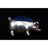 Silver pig pin cushion