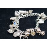 Silver charm bracelet Weight 73g