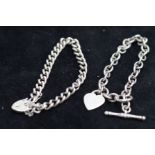 Silver bracelet with heart shaped locket together