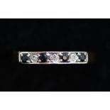 9ct Gold ring set with 3 diamonds & 4 sapphires Si