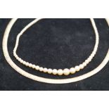 Gold plated silver necklace together with pearl ne