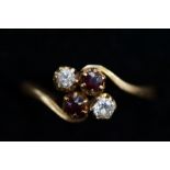 9ct Gold ring set with 1 diamond, 2 garnets & 1 wh